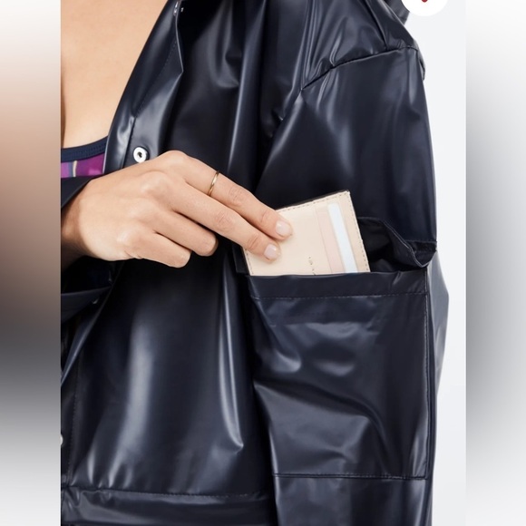 New! Fabletics Kenna Convertible Rain Jacket
Color: Deep Navy Travel Long/Short - Picture 8 of 16